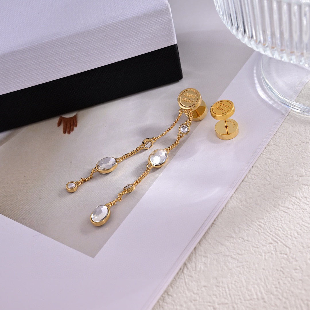 MIUMIU 26S CRYSTAL CHAIN DROP EARRINGS IN GOLD TONE METAL 633263