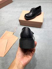 MIUMIU 26S LACE-UP LOAFERS IN BLACK GRAINED CALFSKIN