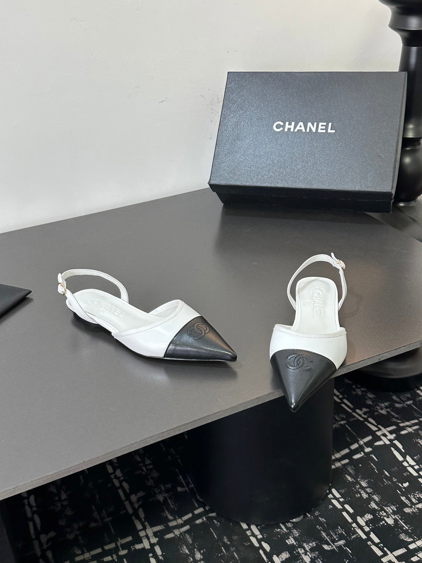 CHANEL 26S POINTED-TOE SLINGBACKS IN WHITE AND BLACK LAMBSKIN