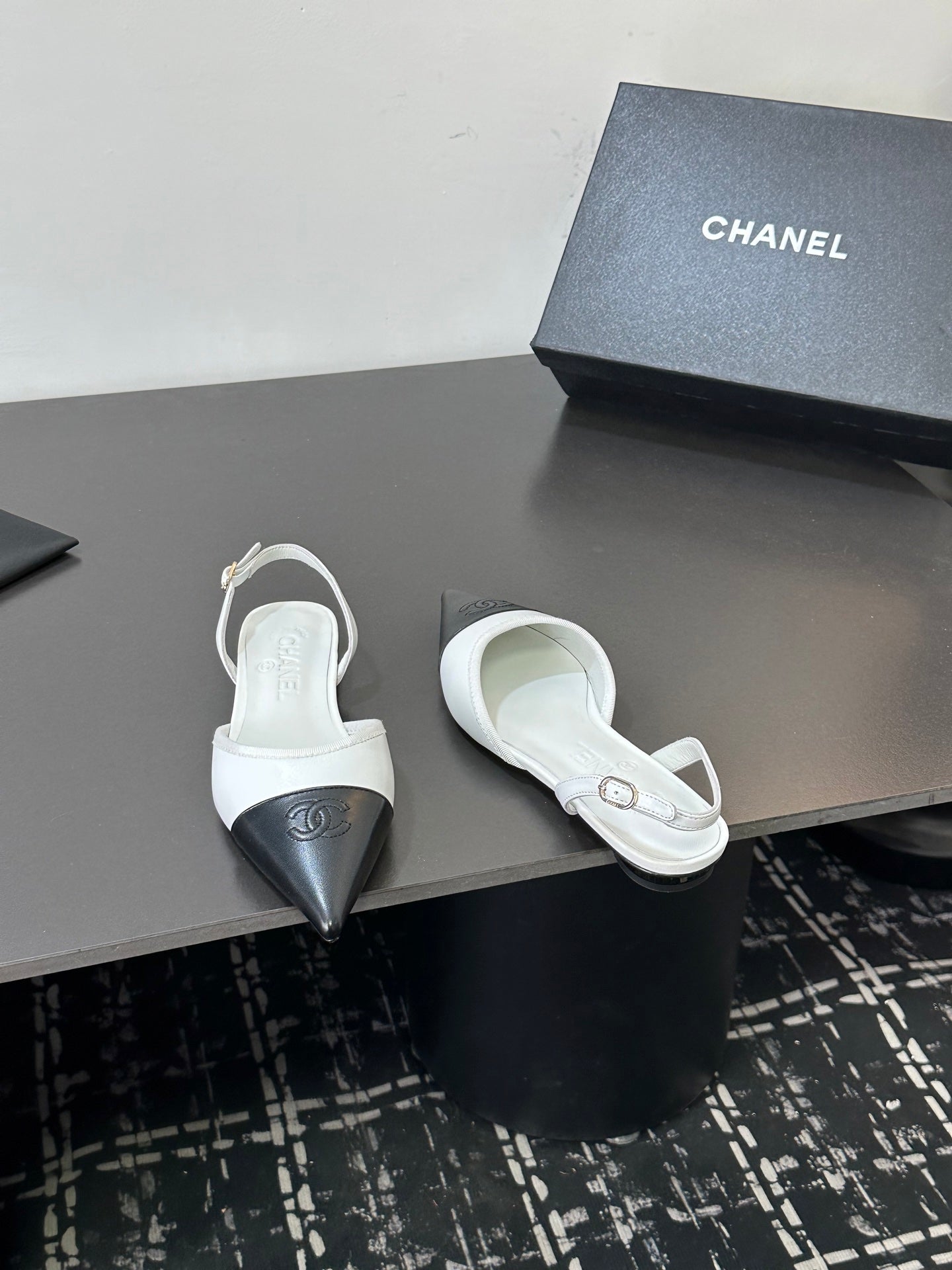 CHANEL 26S POINTED-TOE SLINGBACKS IN WHITE AND BLACK LAMBSKIN