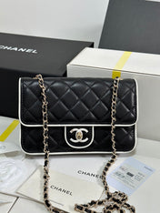 QUILTED FLAP BAG WITH WHITE TRIM 19 IN BLACK LAMBSKIN