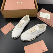 MIUMIU 26S LACE UP SNEAKERS IN WHITE CANVAS RUBBER SOLE
