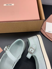 MIUMIU 26S MARY JANE FLATS IN PALE MINT CANVAS LOGO
