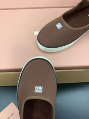 MIUMIU 26S MARY JANE FLATS IN DARK BROWN CANVAS LOGO