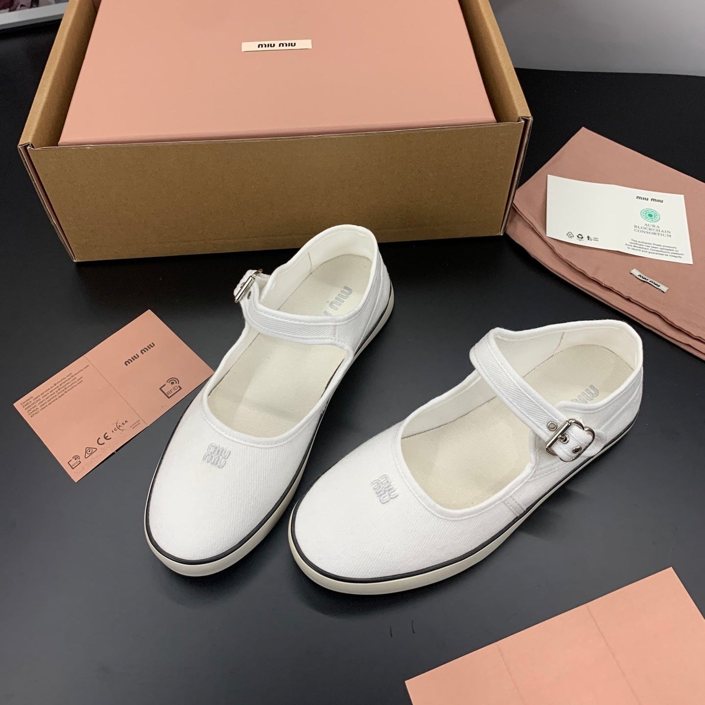 MIUMIU 26S MARY JANE FLATS IN WHITE CANVAS LOGO