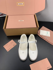 MIUMIU 26S MARY JANE FLATS IN WHITE CANVAS LOGO