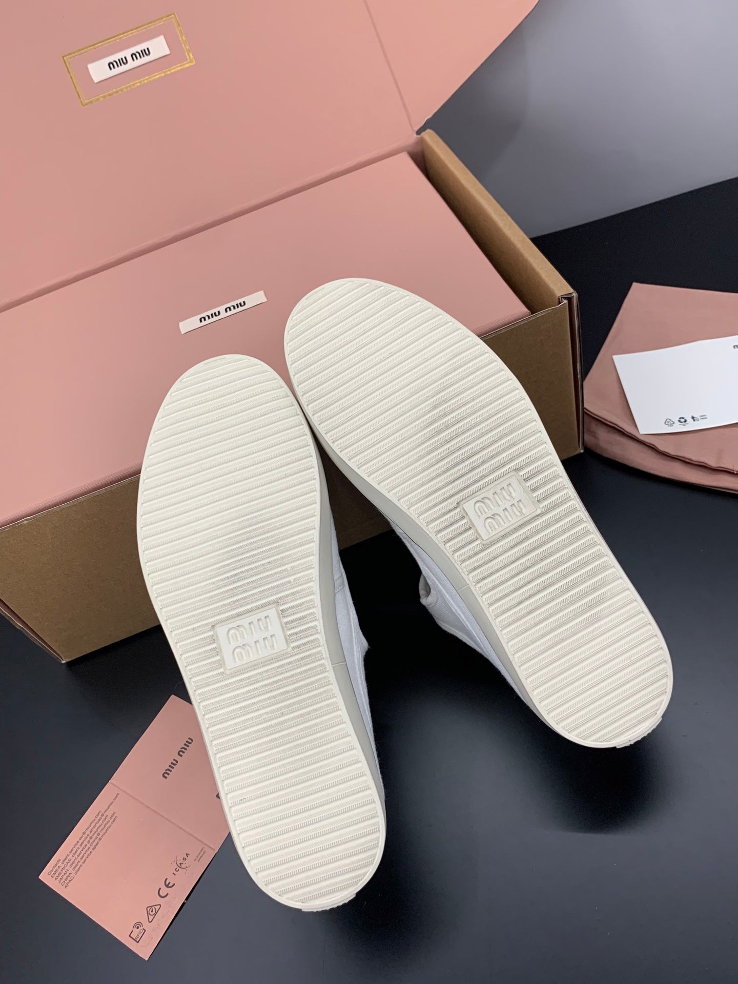 MIUMIU 26S MARY JANE FLATS IN WHITE CANVAS LOGO