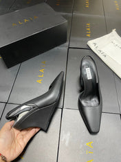 ALAIA 26S WEDGE SLINGBACKS 95 MM IN BLACK CALFSKIN