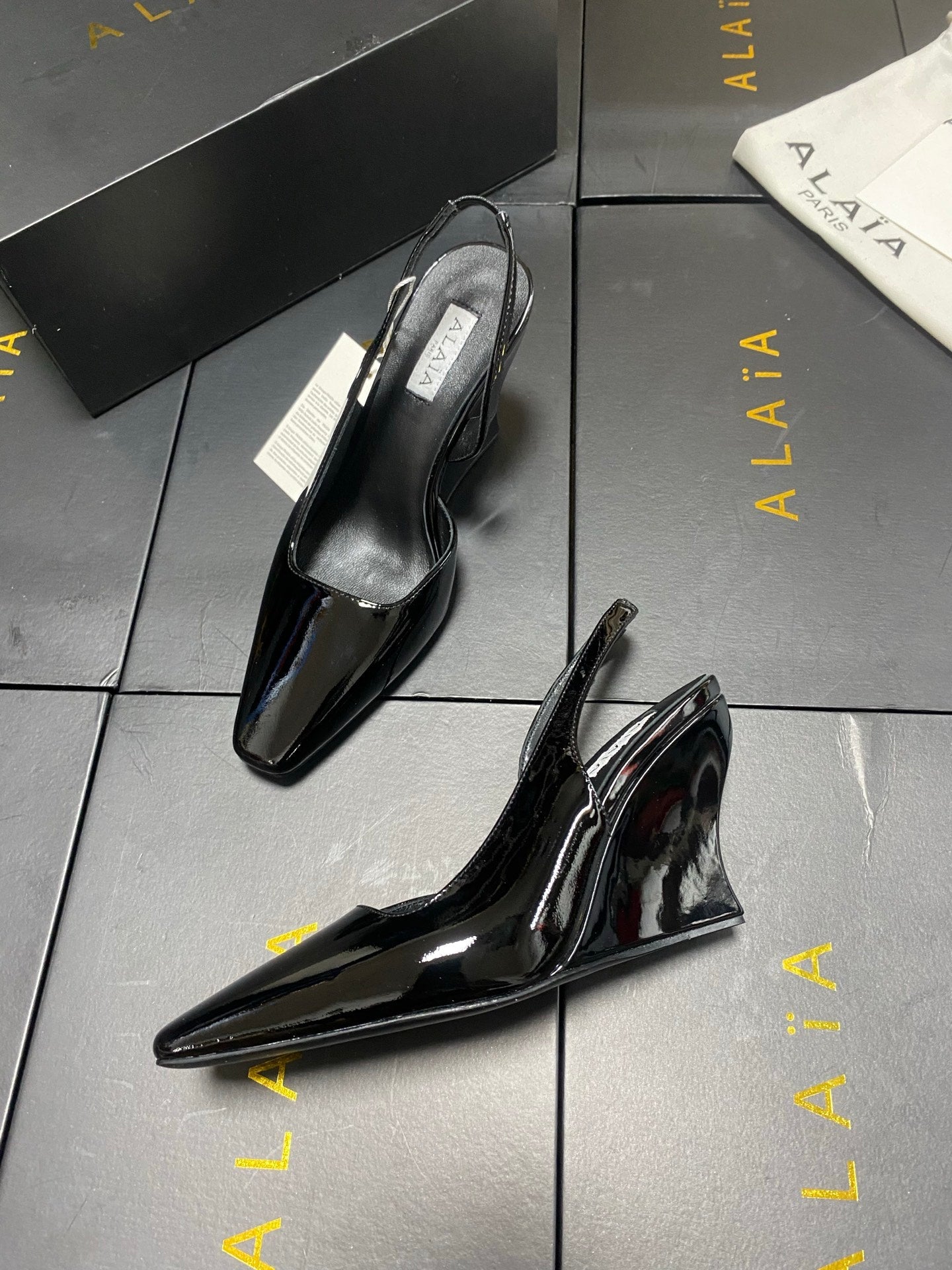 ALAIA 26S WEDGE SLINGBACKS 95 MM IN BLACK PATENT CALFSKIN