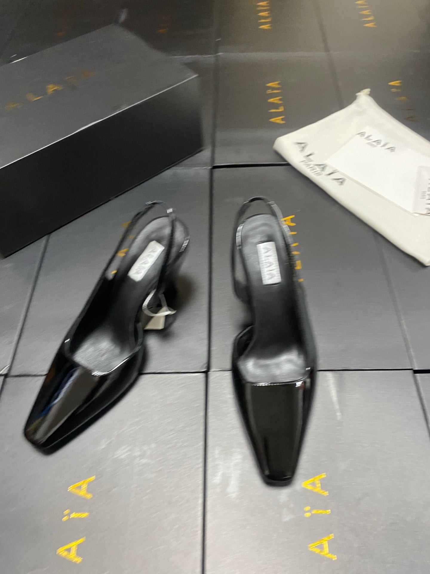 ALAIA 26S WEDGE SLINGBACKS 95 MM IN BLACK PATENT CALFSKIN