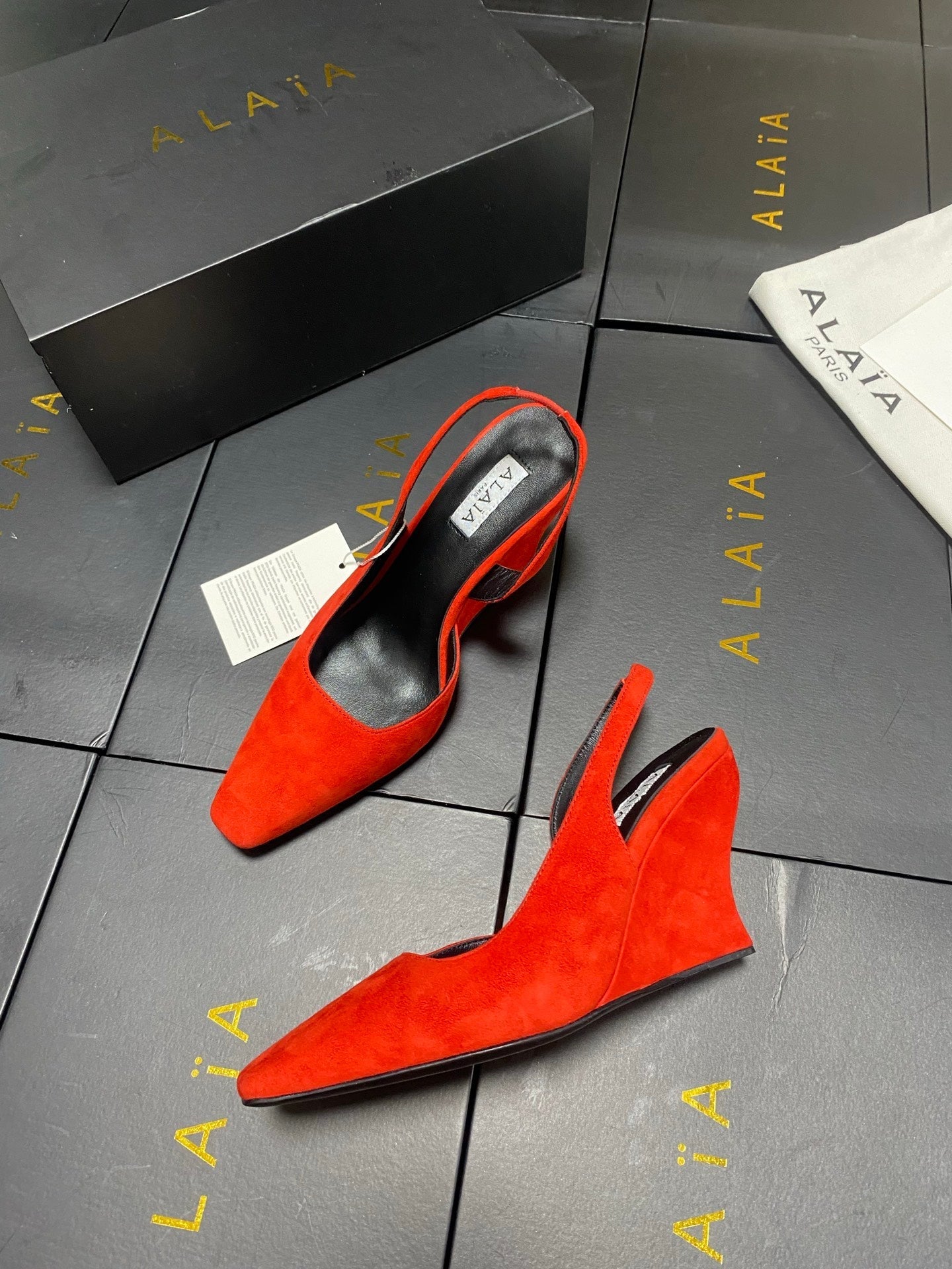 ALAIA 26S WEDGE SLINGBACKS 95 MM IN ORANGE RED SUEDE