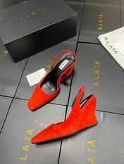 ALAIA 26S WEDGE SLINGBACKS 95 MM IN ORANGE RED SUEDE