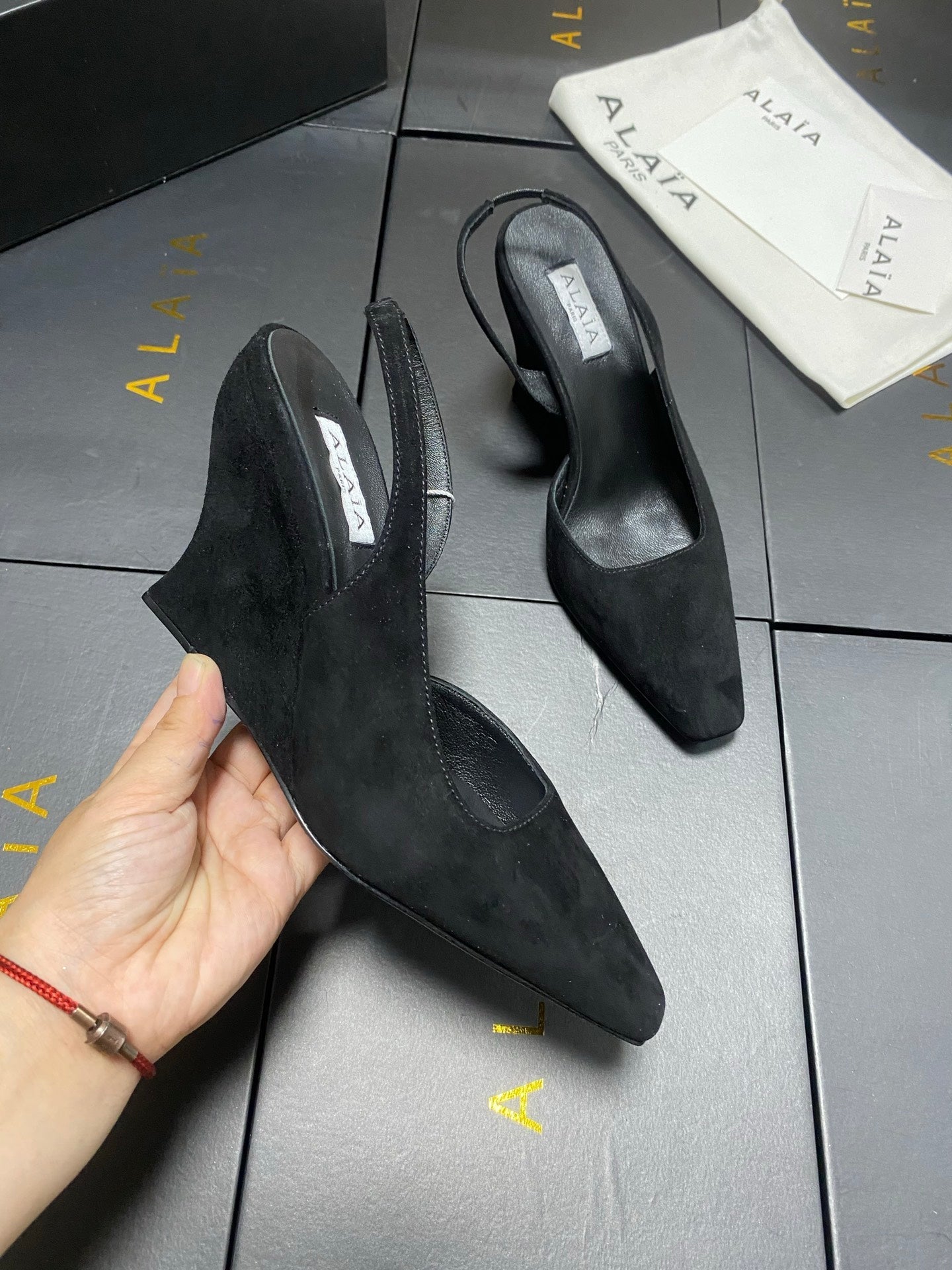 ALAIA 26S WEDGE SLINGBACKS 95 MM IN BLACK SUEDE