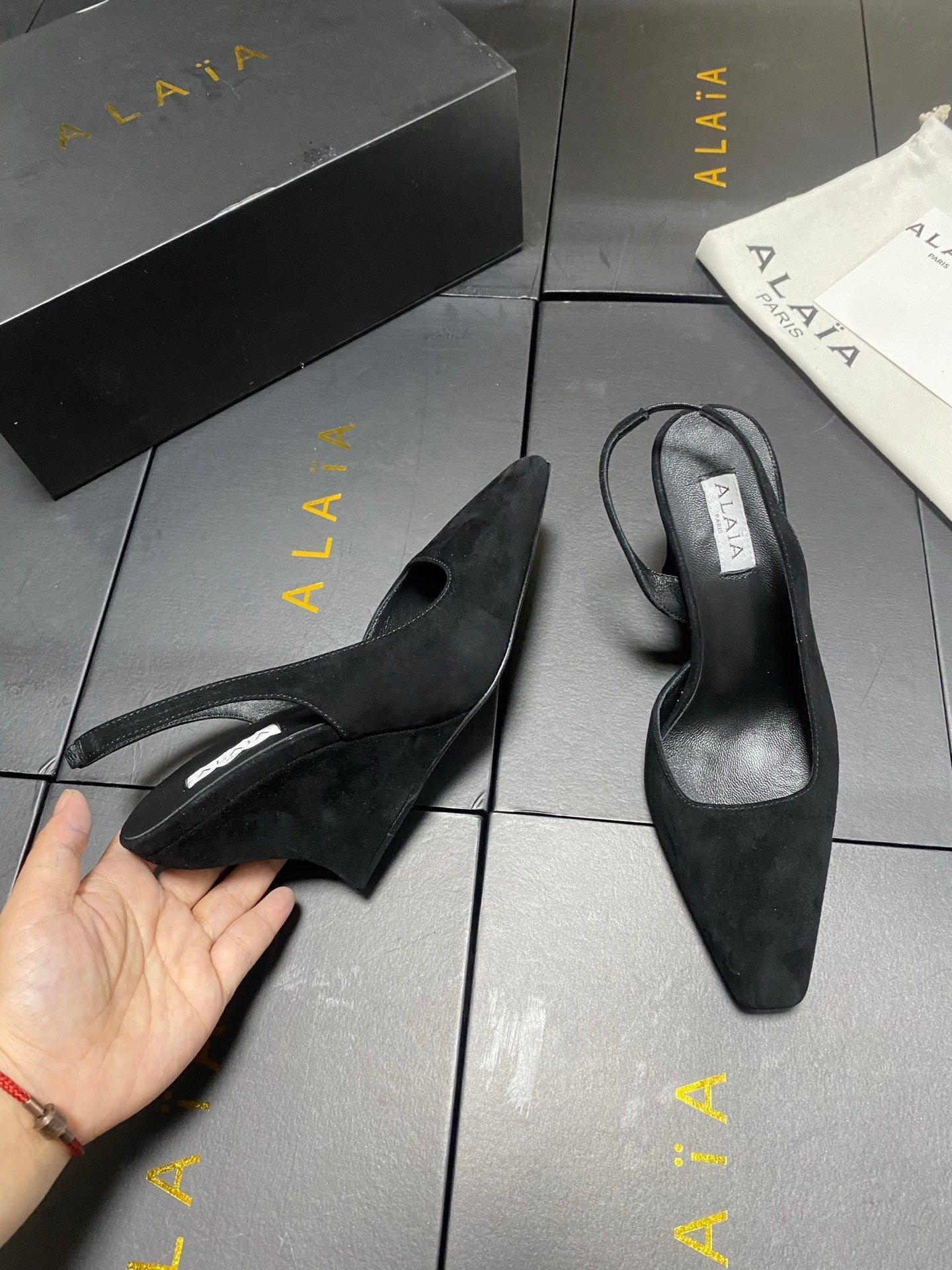 ALAIA 26S WEDGE SLINGBACKS 95 MM IN BLACK SUEDE