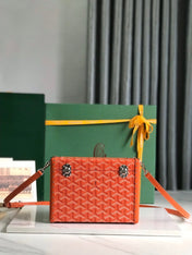 CASSETTE TRUNK BAG 21 IN RED GOYARDINE CANVAS & CLAMECY COWHIDE