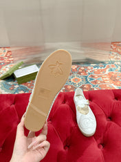 GG CROSS STRAP FLAT SHOES IN WHITE CALFSKIN WITH STRAW SOLE