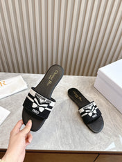 DIOR FLAT SLIDES 25S IN BLACK CALFSKIN AND FABRIC BRAND NAME EMBROIDERY
