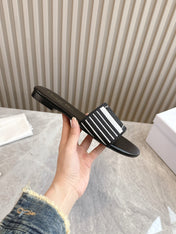 DIOR FLAT SLIDES 25S IN BLACK CALFSKIN AND FABRIC BRAND NAME EMBROIDERY