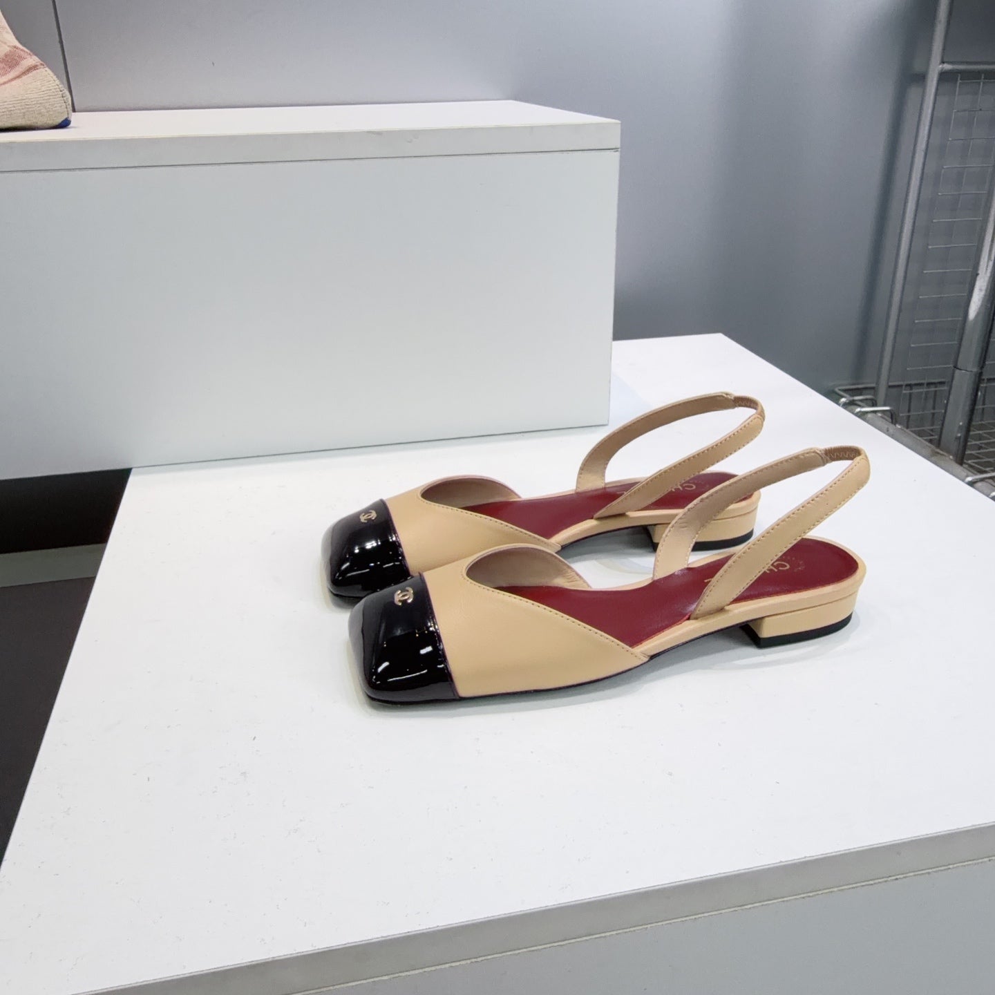 CHANEL 26S FLAT SLINGBACK IN BEIGE LAMBSKIN WITH BLACK CAP TOE