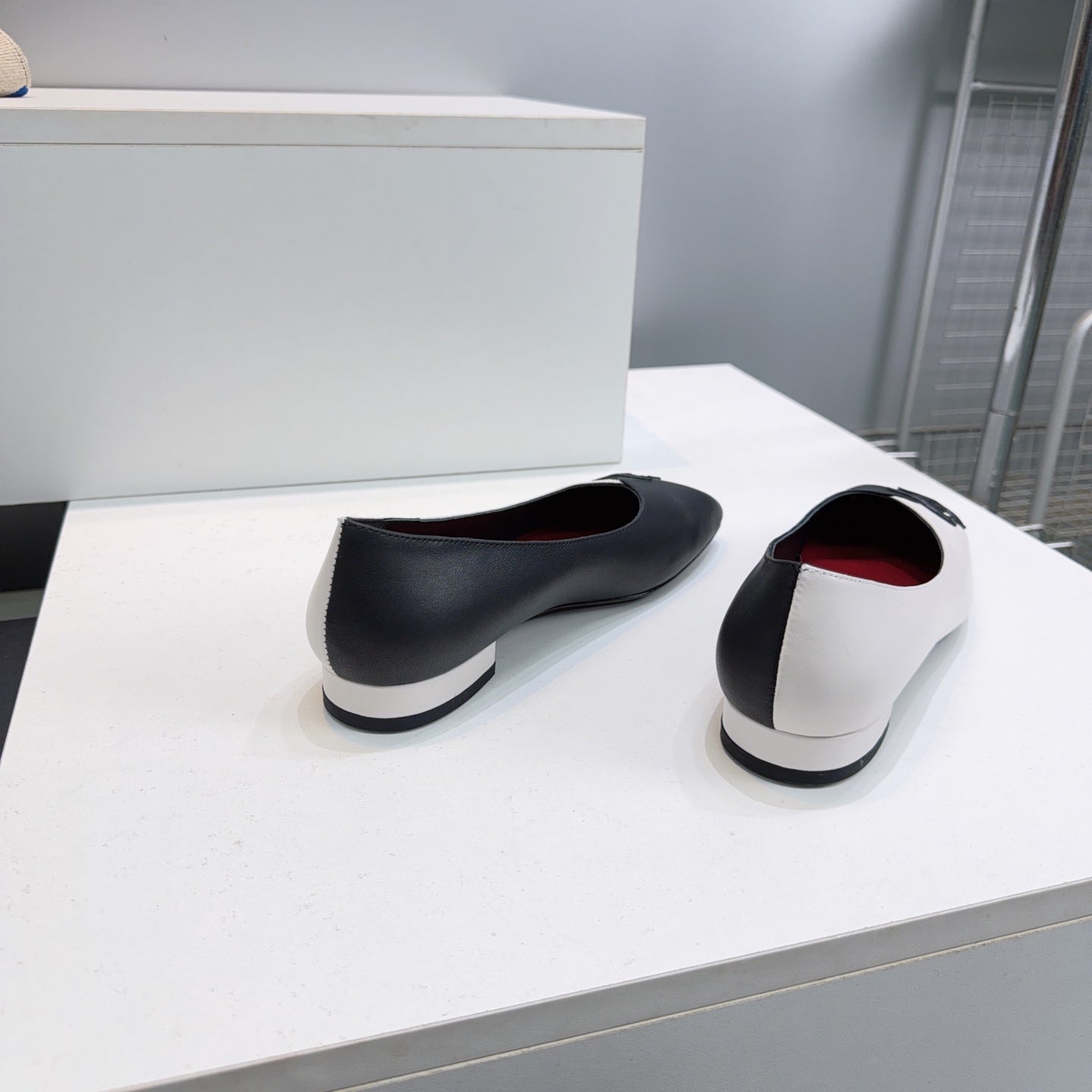 CHANEL 26S SQUARE-TOE FLATS IN BLACK AND WHITE LAMBSKIN