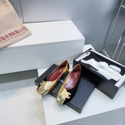 CHANEL 26S SQUARE-TOE FLATS IN GOLD LAMBSKIN AND BLACK SUEDE