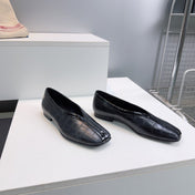 CHANEL 26S SQUARE-TOE FLATS IN BLACK CROCODILE-EMBOSSED LAMBSKIN