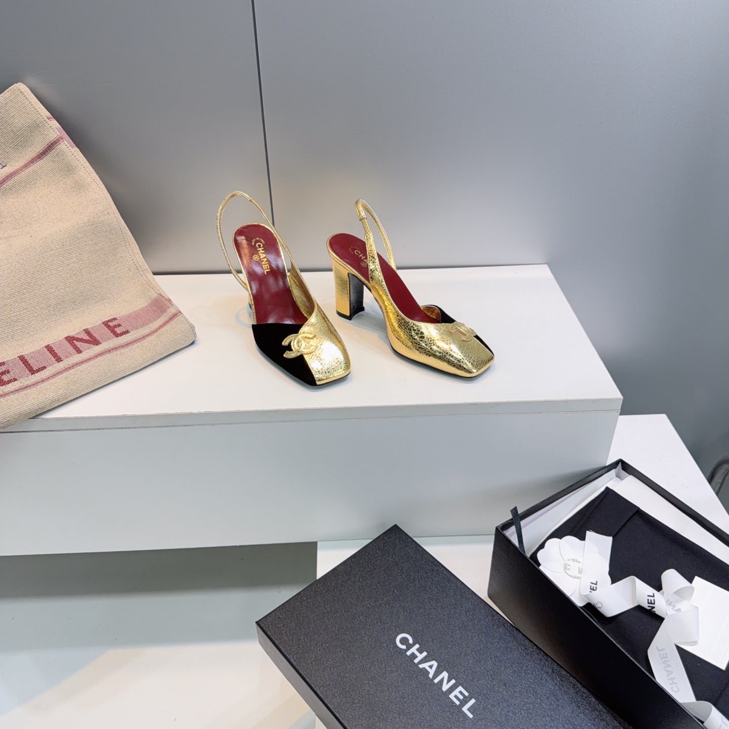 CHANEL 26S SLINGBACK 100 MM IN GOLD LAMBSKIN AND BLACK SUEDE