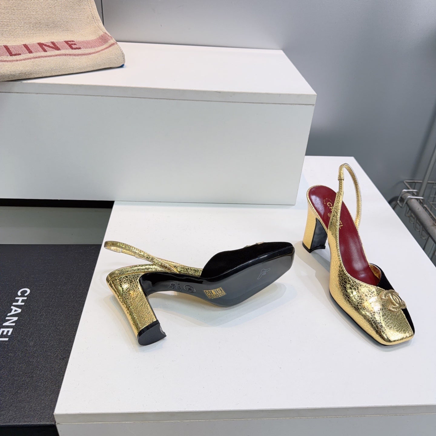 CHANEL 26S SLINGBACK 100 MM IN GOLD LAMBSKIN AND BLACK SUEDE