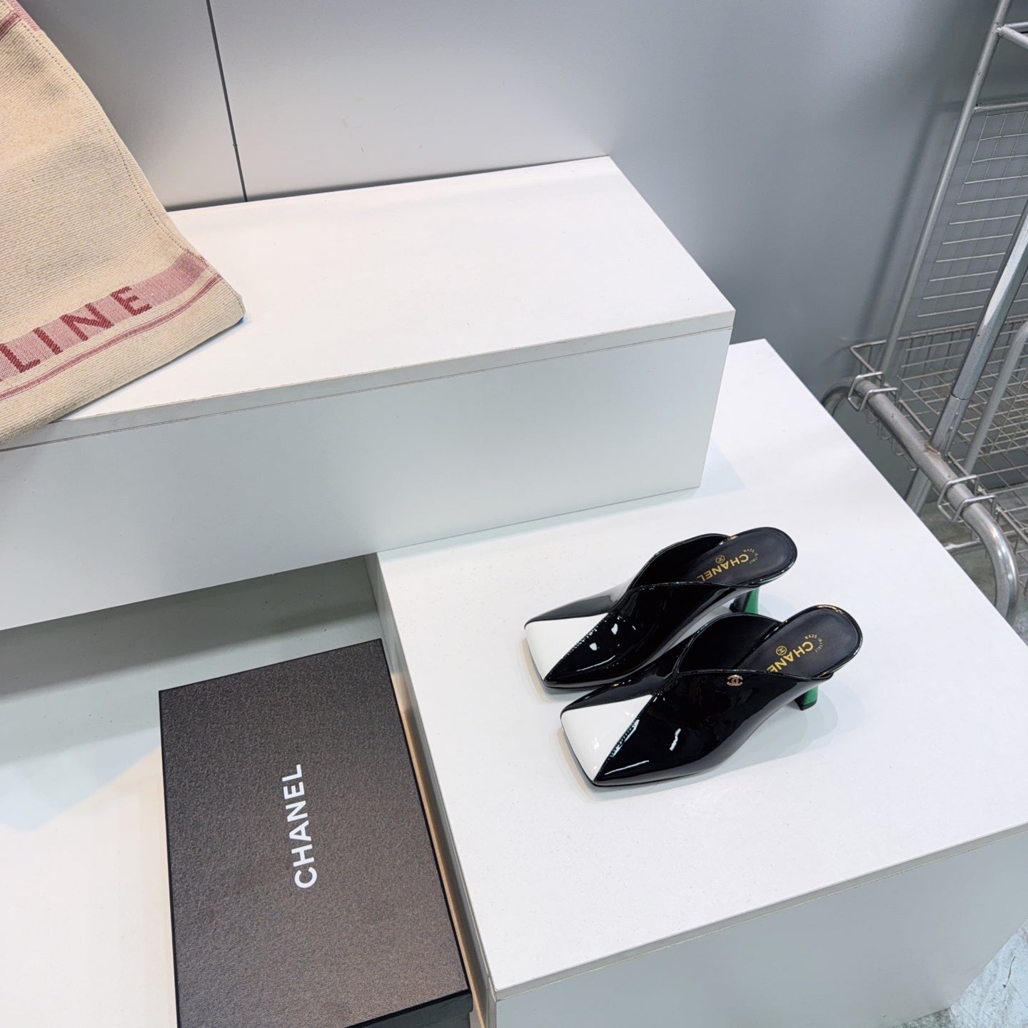 CHANEL 26S HIGH-HEEL MULES 70 MM IN BLACK AND WHITE LAMBSKIN
