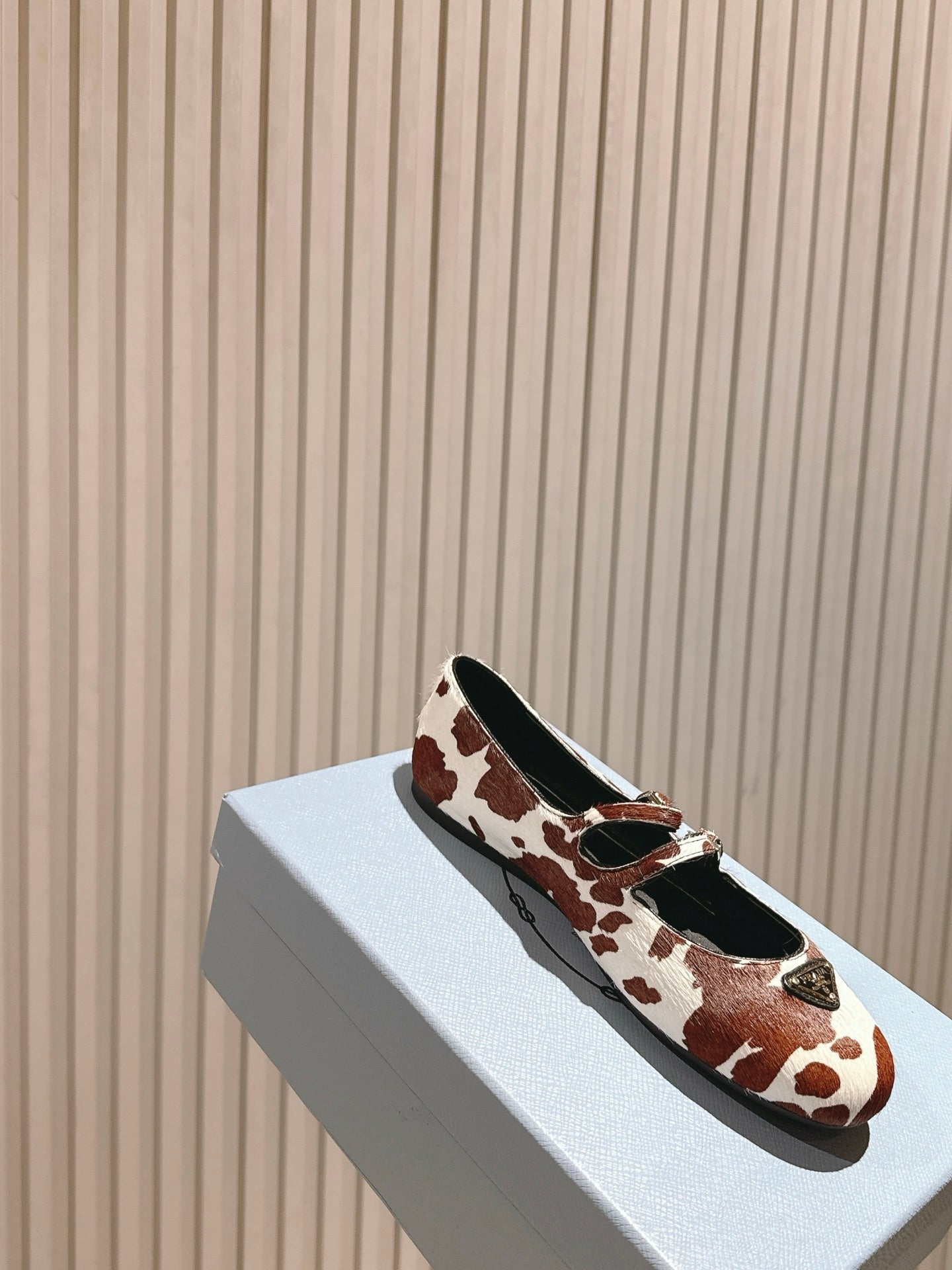 PRADA 25S CRYSTAL EMBELLISHED BALLERINA IN WHITE AND DARK BROWN FUR