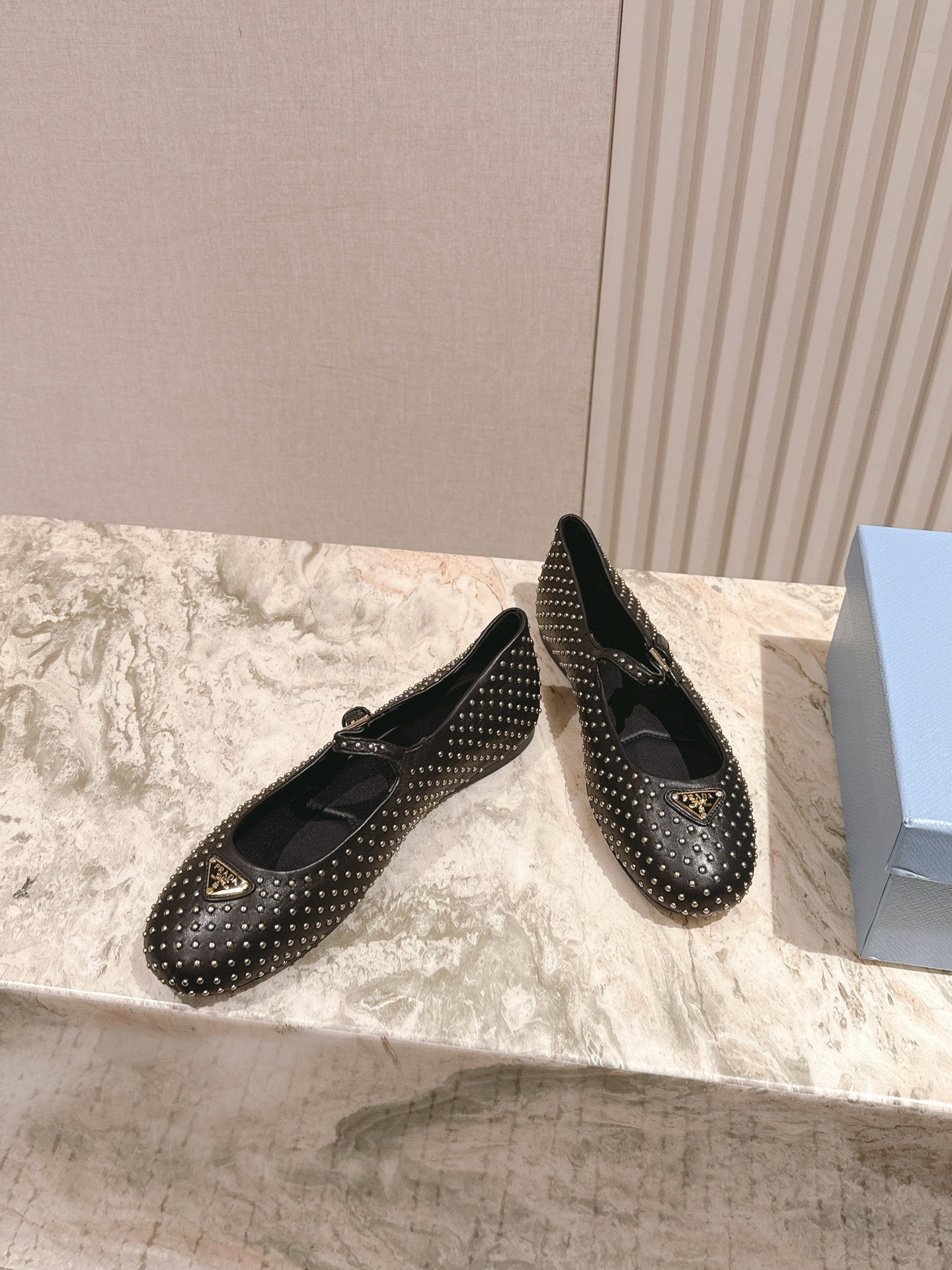 PRADA 25S STUD EMBELLISHED BALLERINA IN BLACK CALFSKIN