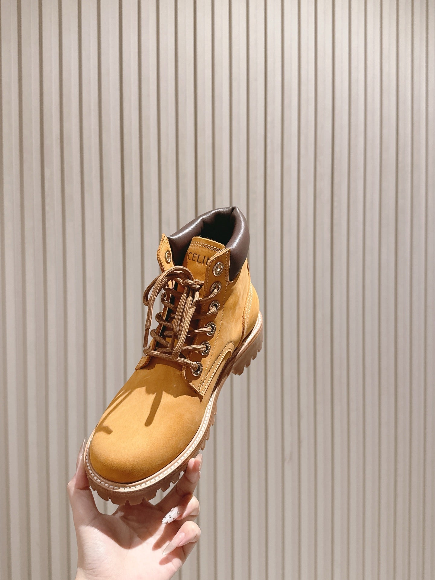 CELINE 25S MARTIN BOOTS IN MEDIUM ORANGE CALFSKIN