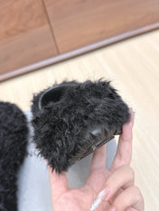 BALENCIAGA 25S MULES IN BLACK FAUX FUR