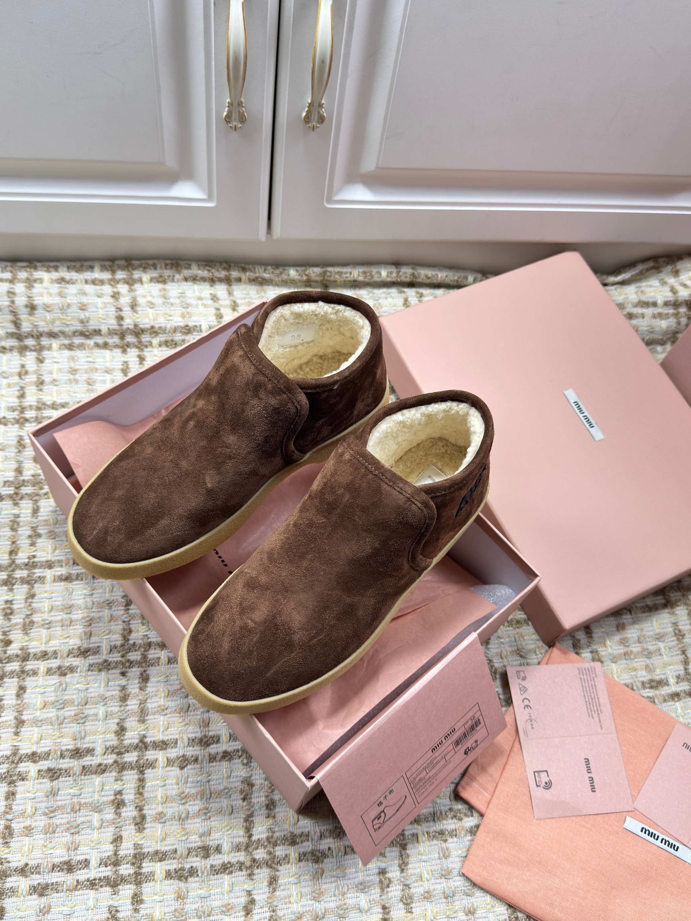 MIUMIU 26S SLIP-ON BOOTIES IN DARK BROWN SUEDE WITH SHEARLING