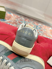 GUCCI 26S SCREENER SNEAKER IN DARK GREY CANVAS AND LEATHER