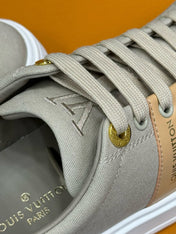 LV TIME OUT SNEAKER IN PASTEL GRAY MIX MACAROON GOLD CANVAS