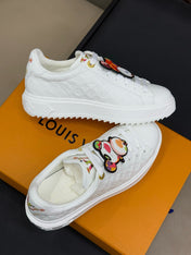 TIME OUT SNEAKER IN WHITE EMBOSSED MONOGRAM CALFSKIN