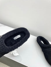 ALAIA 26S MULE IN BLACK SUEDE AND WOOL