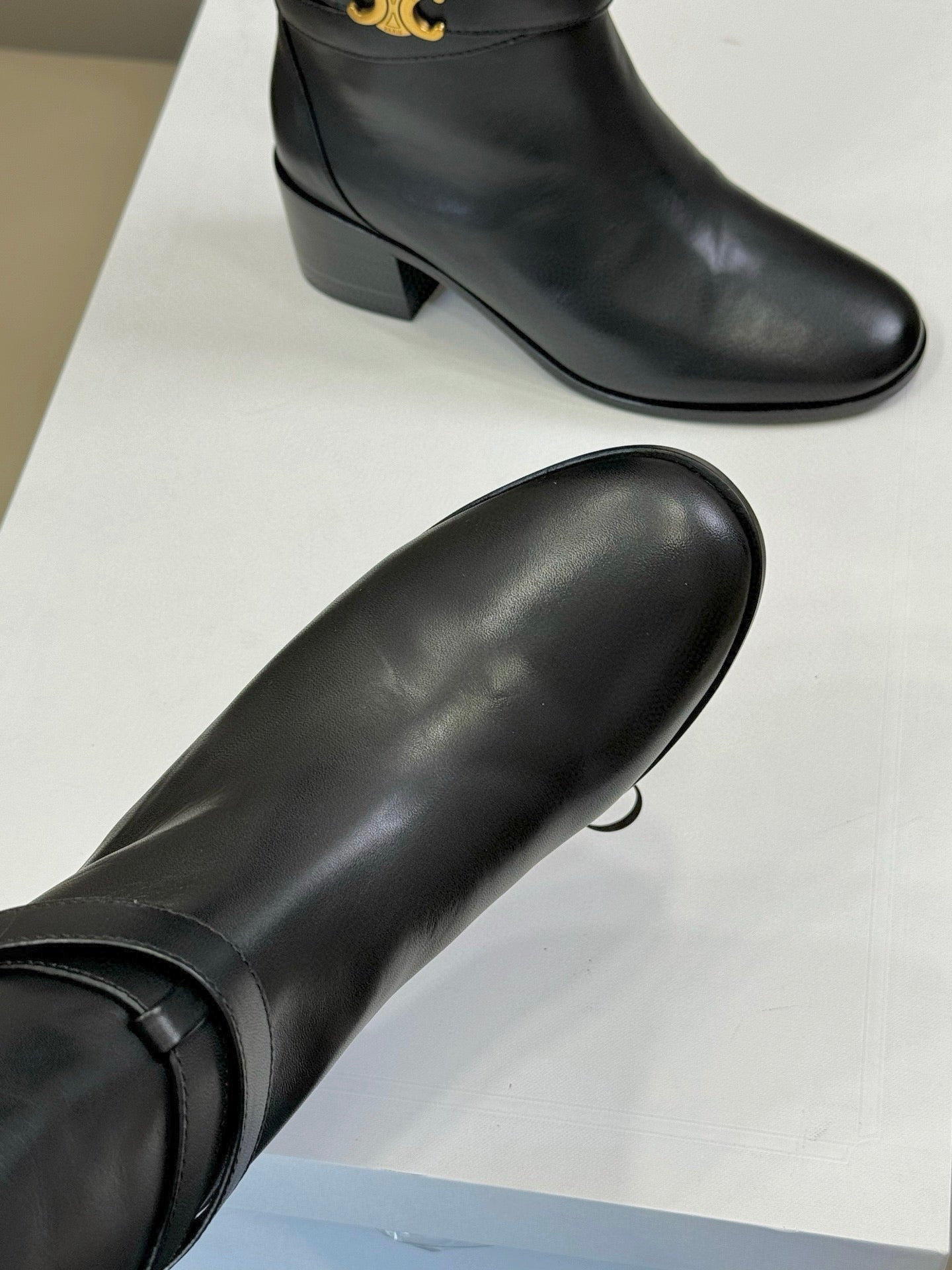 CELINE 26S HIGH-TOP HEELED BOOTS IN BLACK CALFSKIN