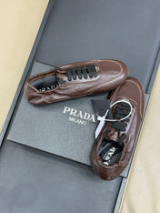 PRADA 25S COLLAPSE FLAT SHOES IN DARK BROWN CALFSKIN