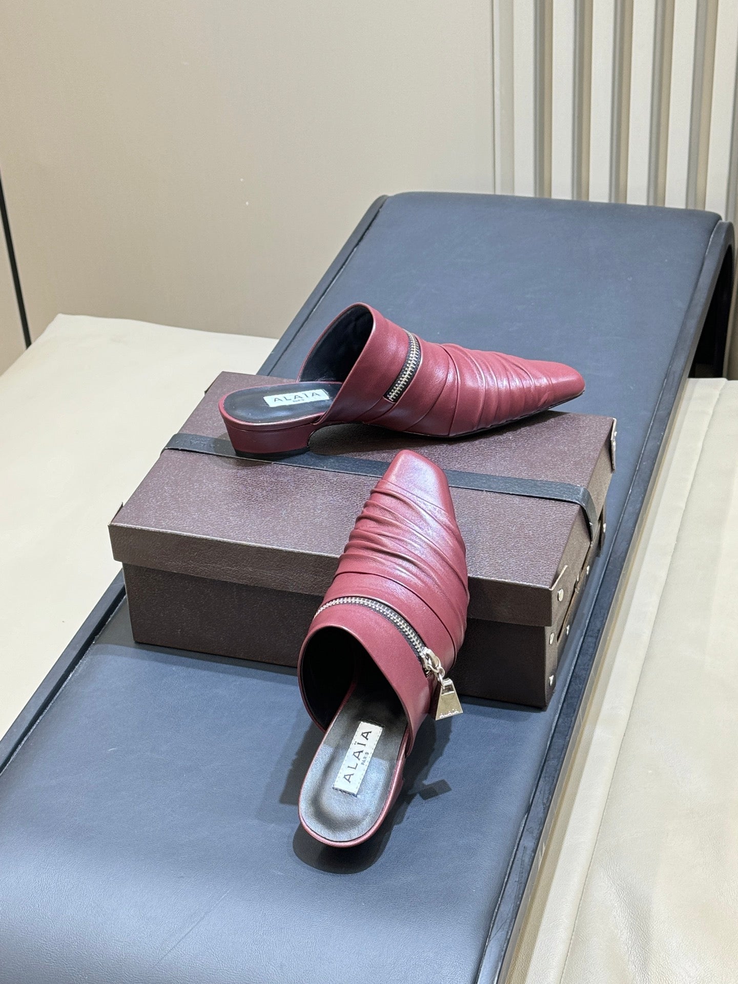 ALAIA 26S PLEATED MULES IN DARK RED LAMBSKIN