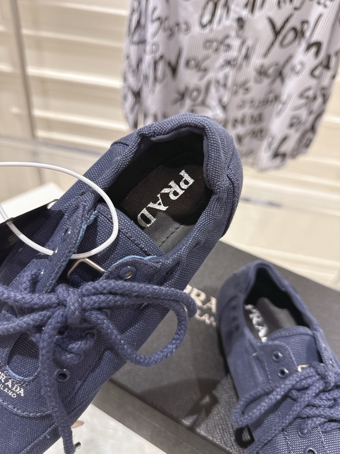 PRADA 26S COLLAPSE SNEAKERS IN BLUE CANVAS
