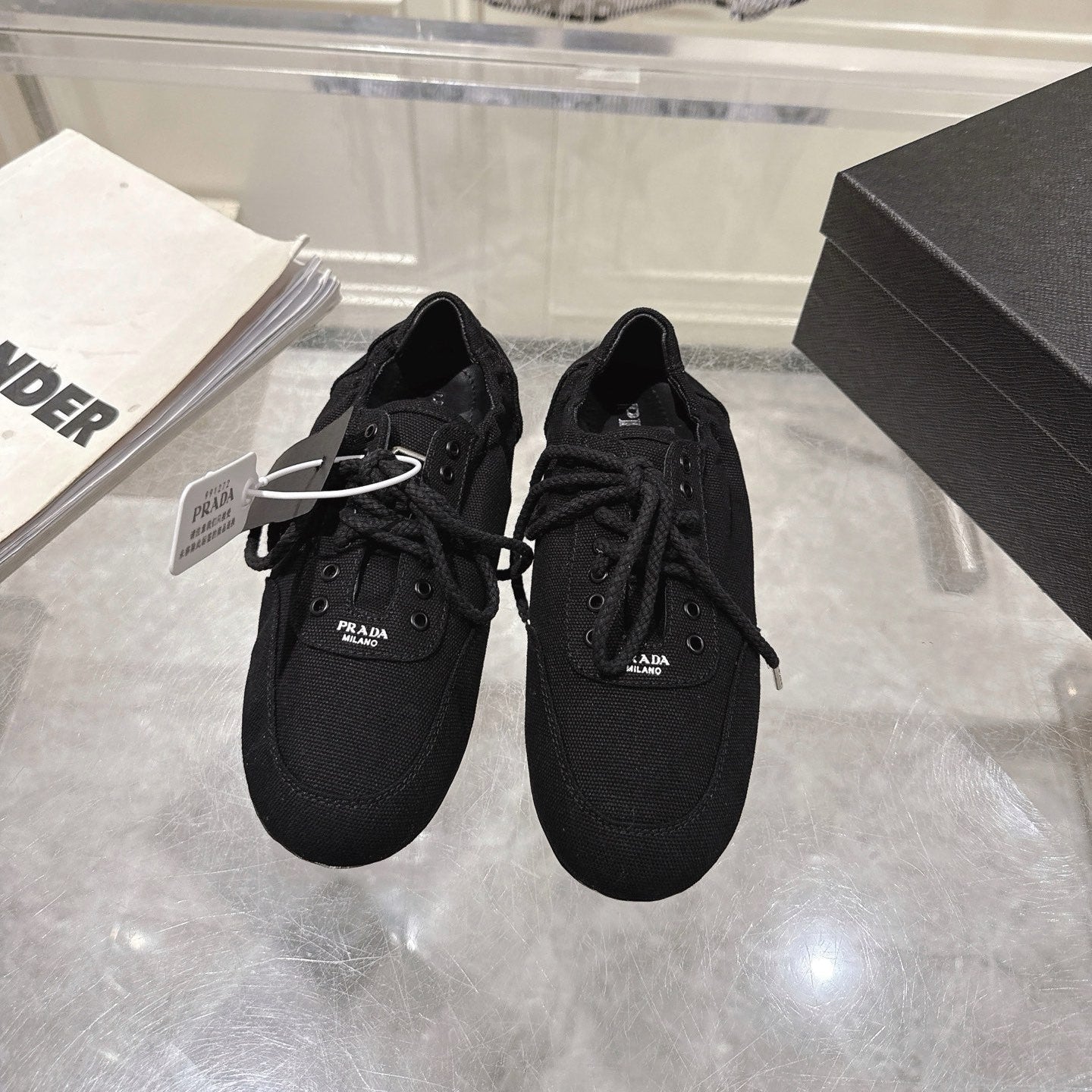 PRADA 26S COLLAPSE SNEAKERS IN BLACK CANVAS