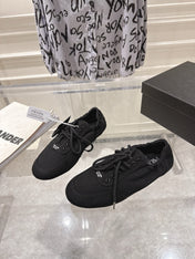 PRADA 26S COLLAPSE SNEAKERS IN BLACK CANVAS