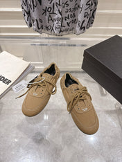 PRADA 26S COLLAPSE SNEAKERS IN BROWN CANVAS