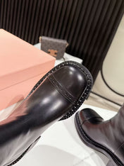 MIUMIU 26S PLATFORM HIGH-HEEL BOOTS 50MM IN BLACK GLOSSY CALFSKIN