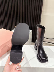 MIUMIU 26S PLATFORM HIGH-HEEL BOOTS 50MM IN BLACK GLOSSY CALFSKIN