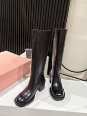 MIUMIU 26S HIGH-ANKLE BOOTS 50MM IN BLACK GLOSSY CALFSKIN