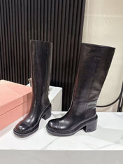 MIUMIU 26S HIGH-ANKLE BOOTS 50MM IN BLACK GLOSSY CALFSKIN