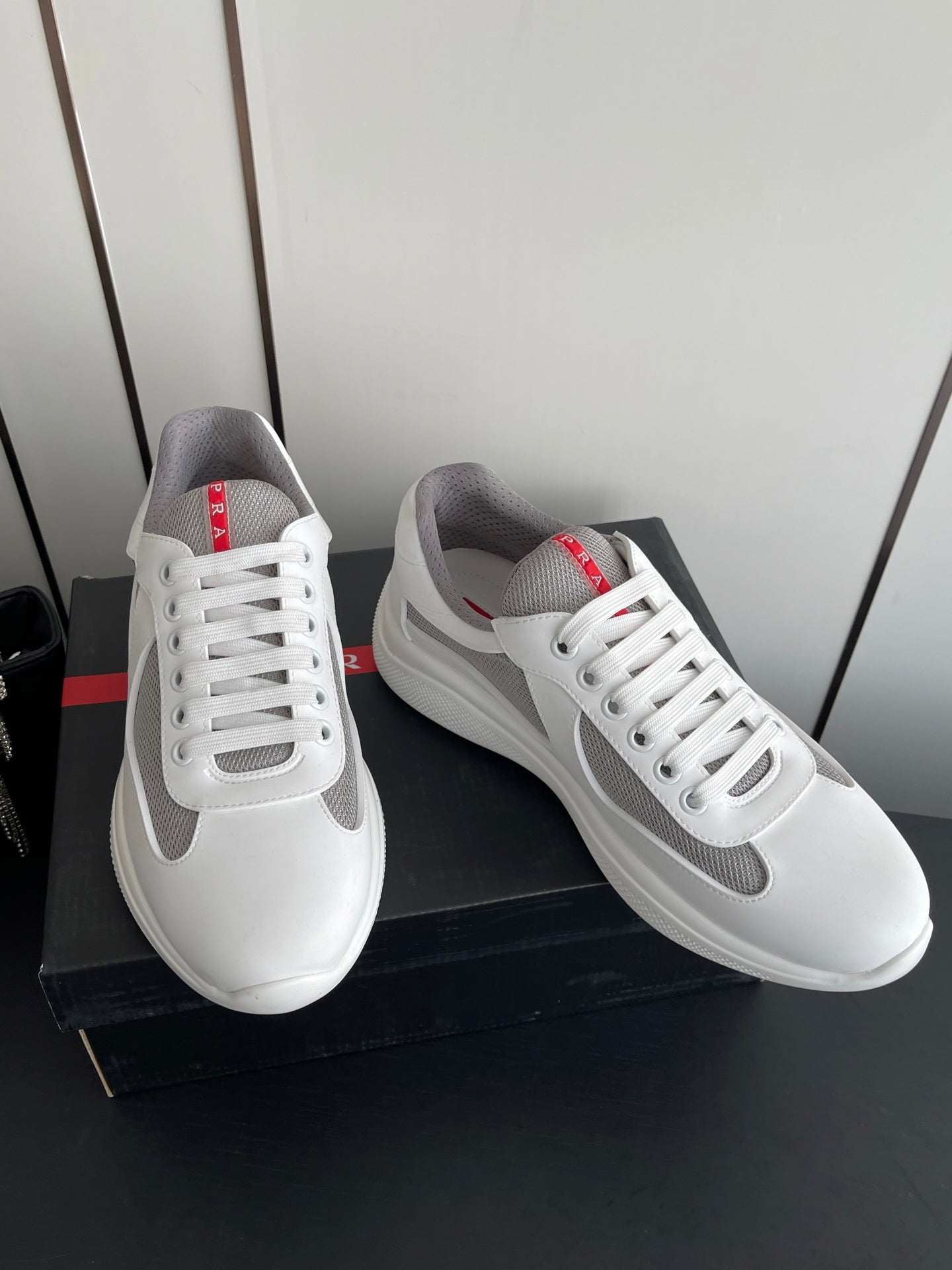 PRADA 26S AMERICA CUP SNEAKERS IN WHITE SOFT RUBBER AND BIKE FABRIC